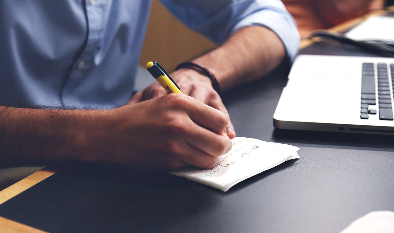 Content calendar and article drafts laid out for a small business marketing plan