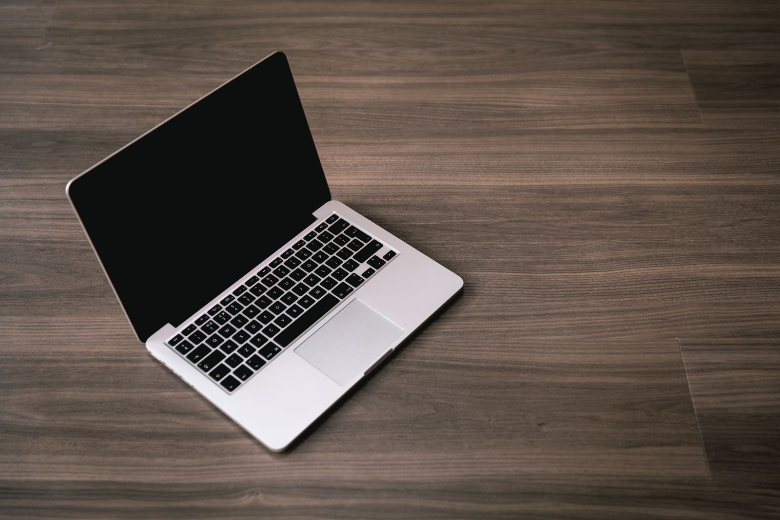 Person using a laptop with accessibility settings and screen reader enabled